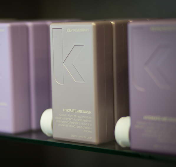 A closeup of Kevin Murphy hair care products